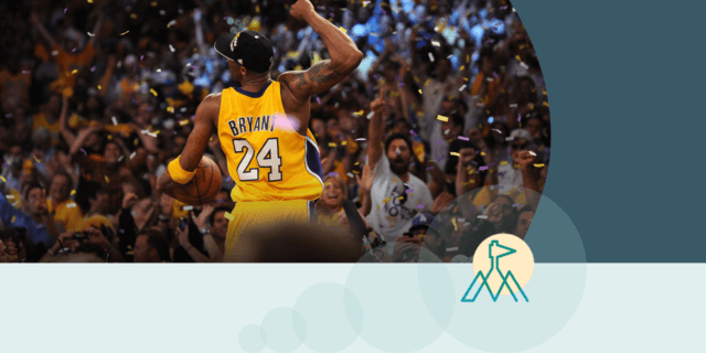 Kobe Bryant celebrating with his hands raised high, surrounded by falling confetti, smiling triumphantly after a victorious moment.